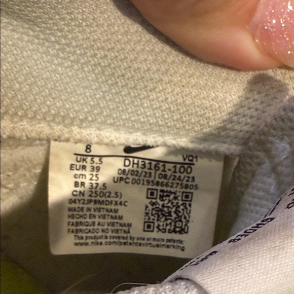 Nike White and Black Athletic Shoes with Orange Accents - Picture 2 of 4